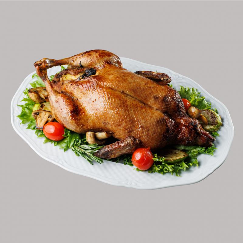 Качка фарширована апельсинами та яблуками